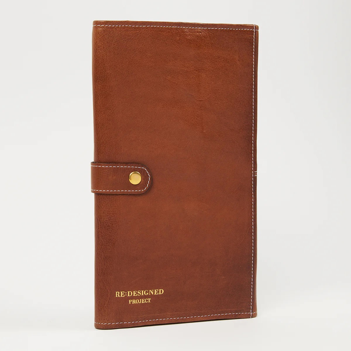 Red-brown leather knitting needle case with gold accent on a white background